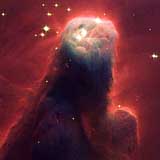 Photo of a pillar of gas and dust called the Cone Nebula